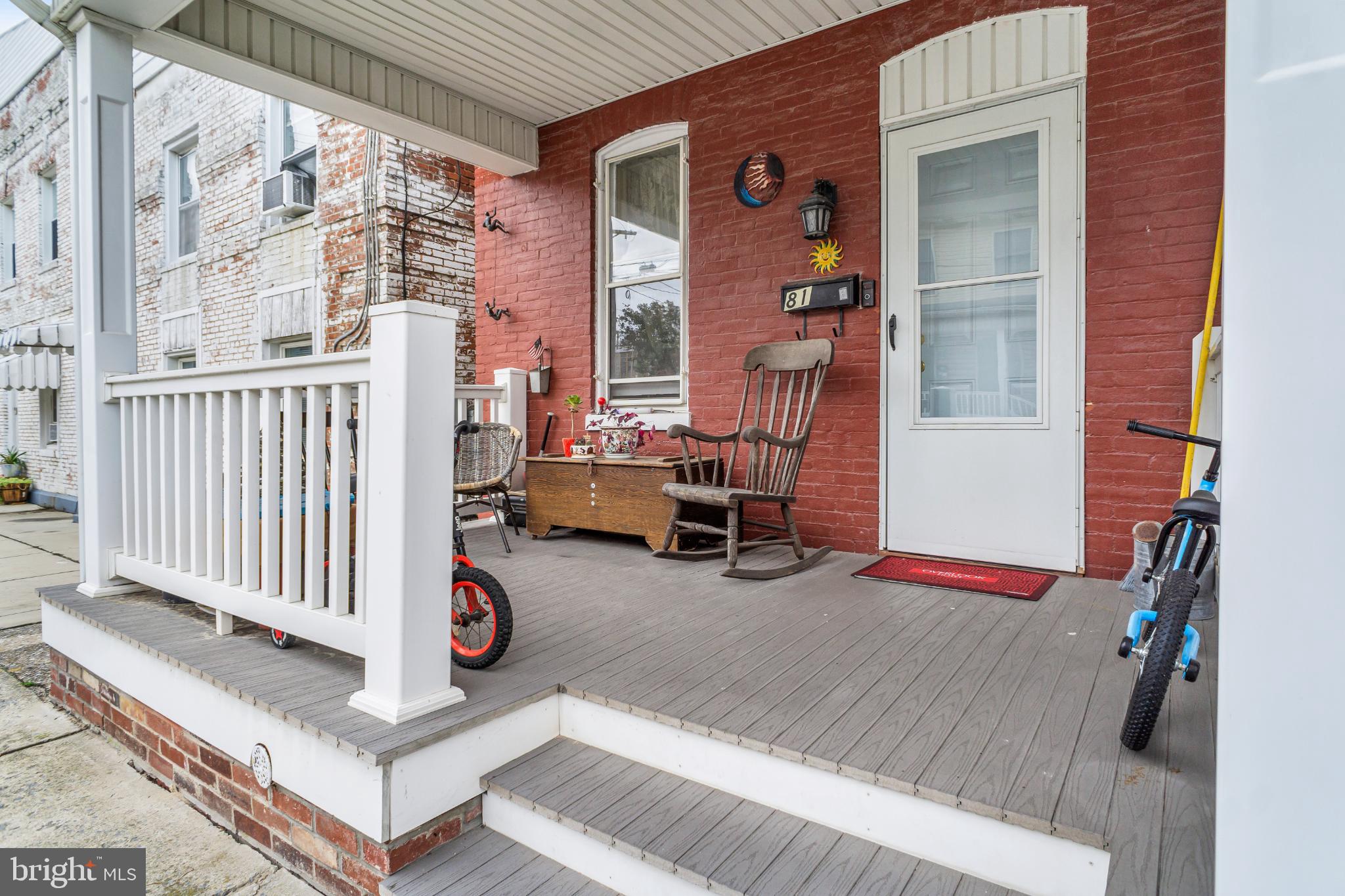81 1st Avenue, Unit E Red Lion, PA 17356 - Photo 3 of 19 Charming porch with inviting rustic details.