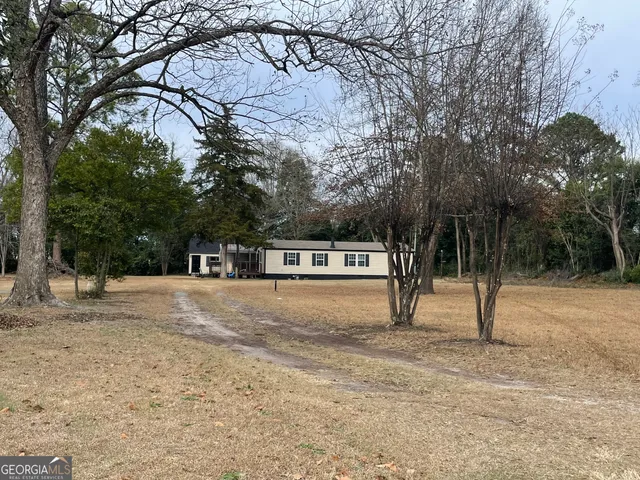 a view of open space with trees