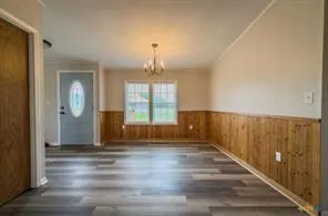 a view of room with a ceiling fan and window