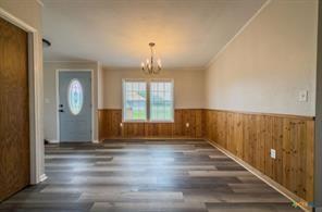 3627 North Katy Road Ross, TX 76640 - Photo 16 of 31 a view of entryway with wooden floor
