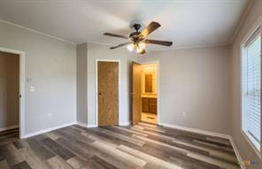 3627 North Katy Road Ross, TX 76640 - Photo 20 of 31 a view of a livingroom with a chandelier fan and a window