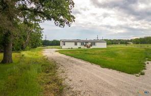 3627 North Katy Road Ross, TX 76640 - Photo 30 of 31 a view of a golf course with a lake