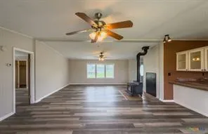 a view of an empty room and window