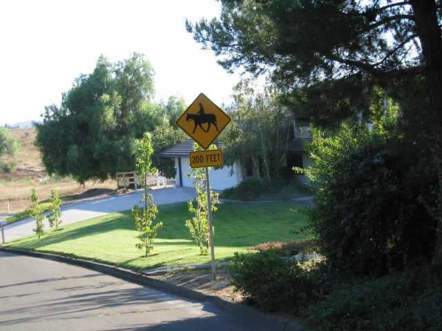 0 Avenida Estrada Temecula, CA 92591 - Photo 4 of 8 a front view of a house with garden
