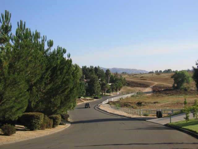 0 Avenida Estrada Temecula, CA 92591 - Photo 8 of 8 a view of a street with a building in the background
