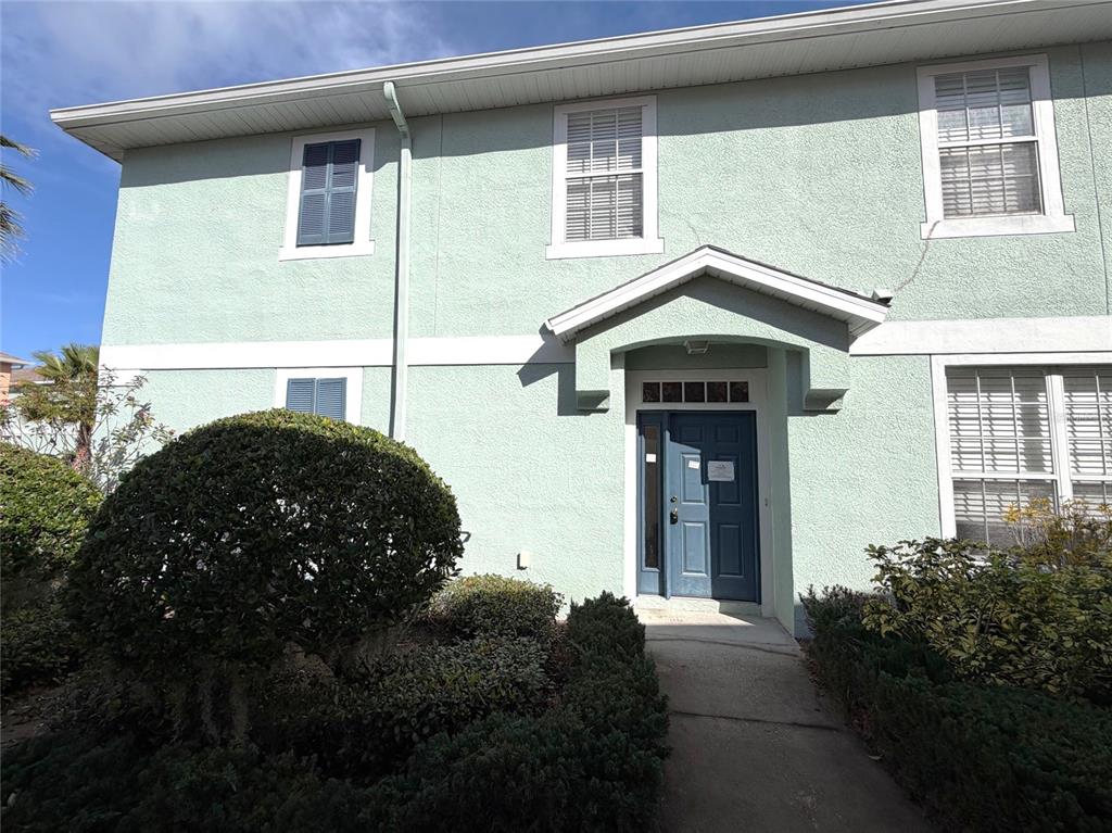 5318 Anhinga Trail New Port Richey, FL 34653 - Photo 17 of 17 a front view of a house with garden
