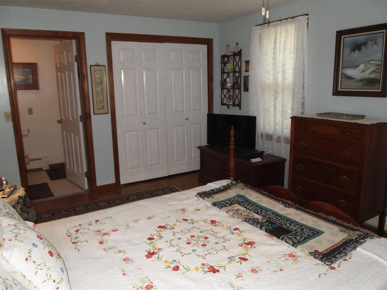 161 Capn Crosby Road Centerville, MA 02632 - Photo 12 of 23 a bedroom with a bed and a dresser