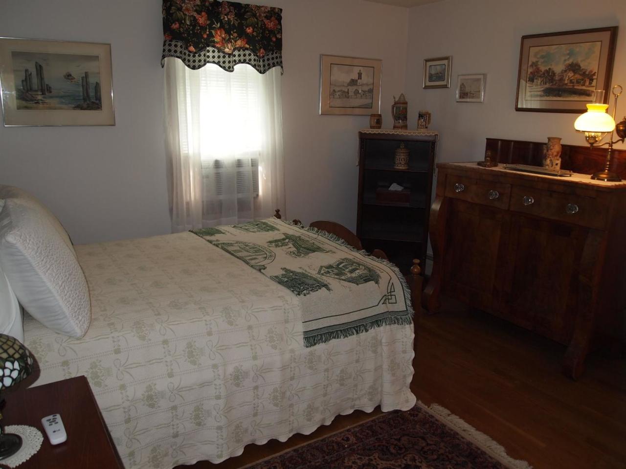 161 Capn Crosby Road Centerville, MA 02632 - Photo 13 of 23 a bedroom with a bed and a window