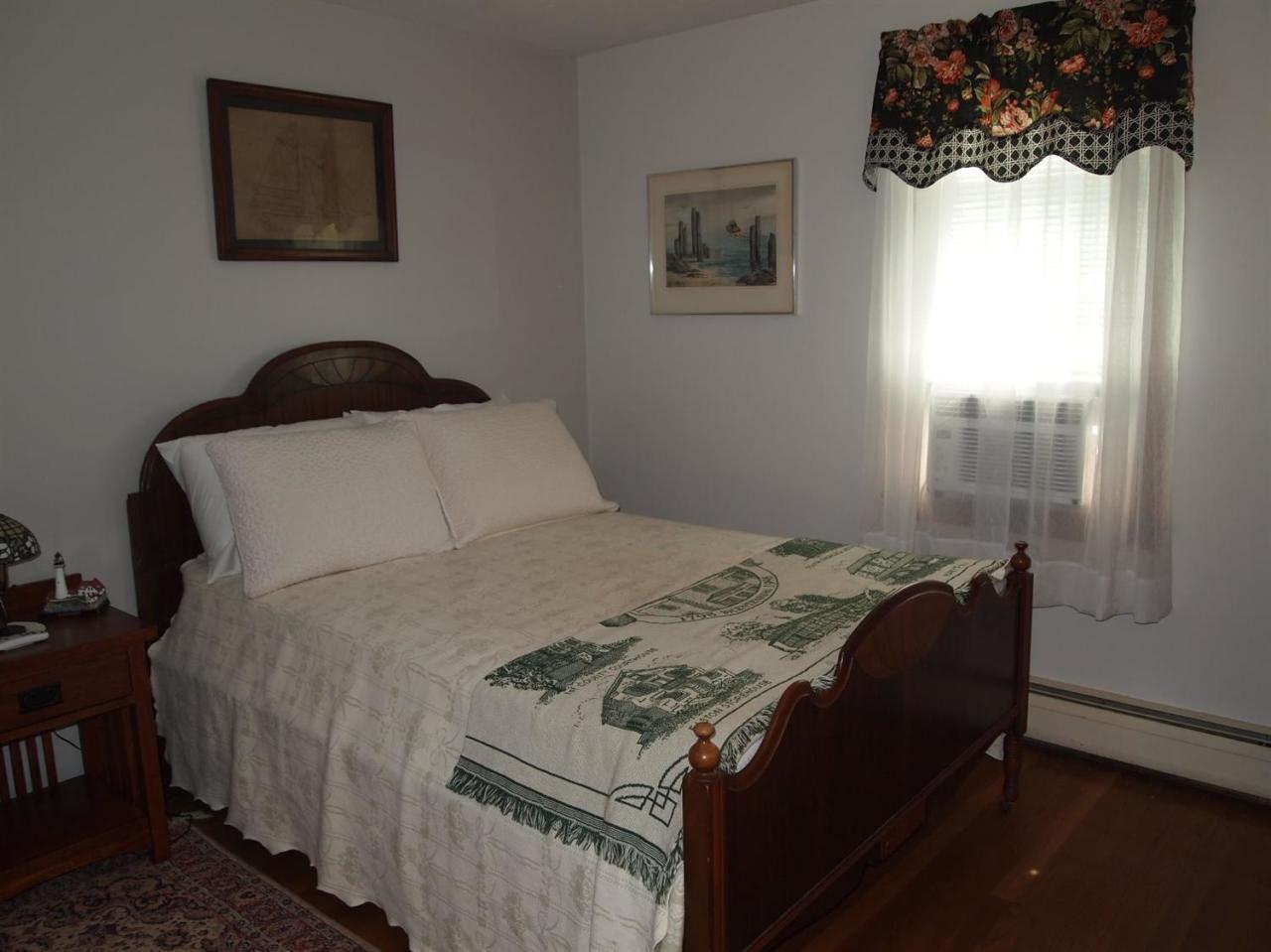 161 Capn Crosby Road Centerville, MA 02632 - Photo 14 of 23 a bedroom with bed and window