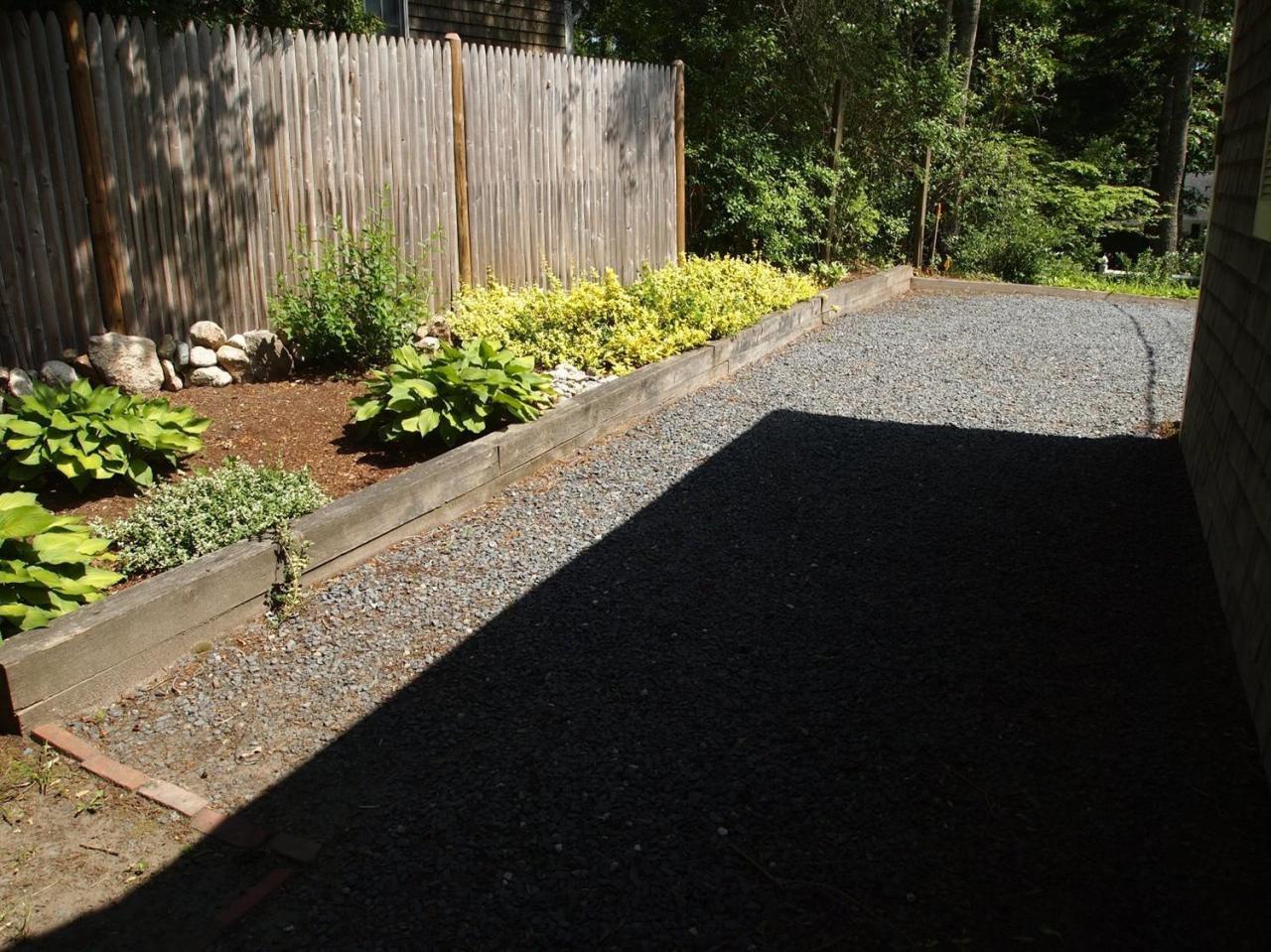 161 Capn Crosby Road Centerville, MA 02632 - Photo 23 of 23 a view of a garden with plants