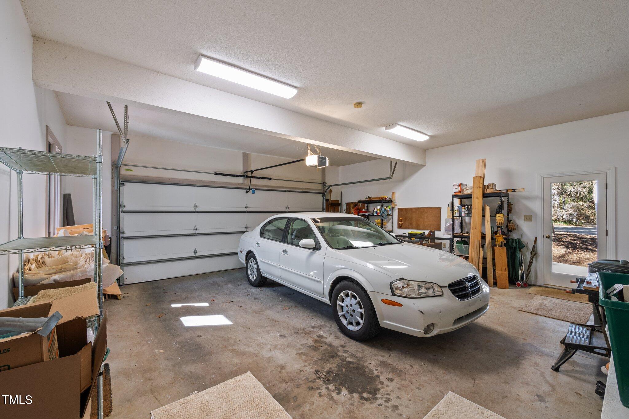8804 Ross Court Raleigh, NC 27613 - Photo 36 of 38 a car parked in a garage