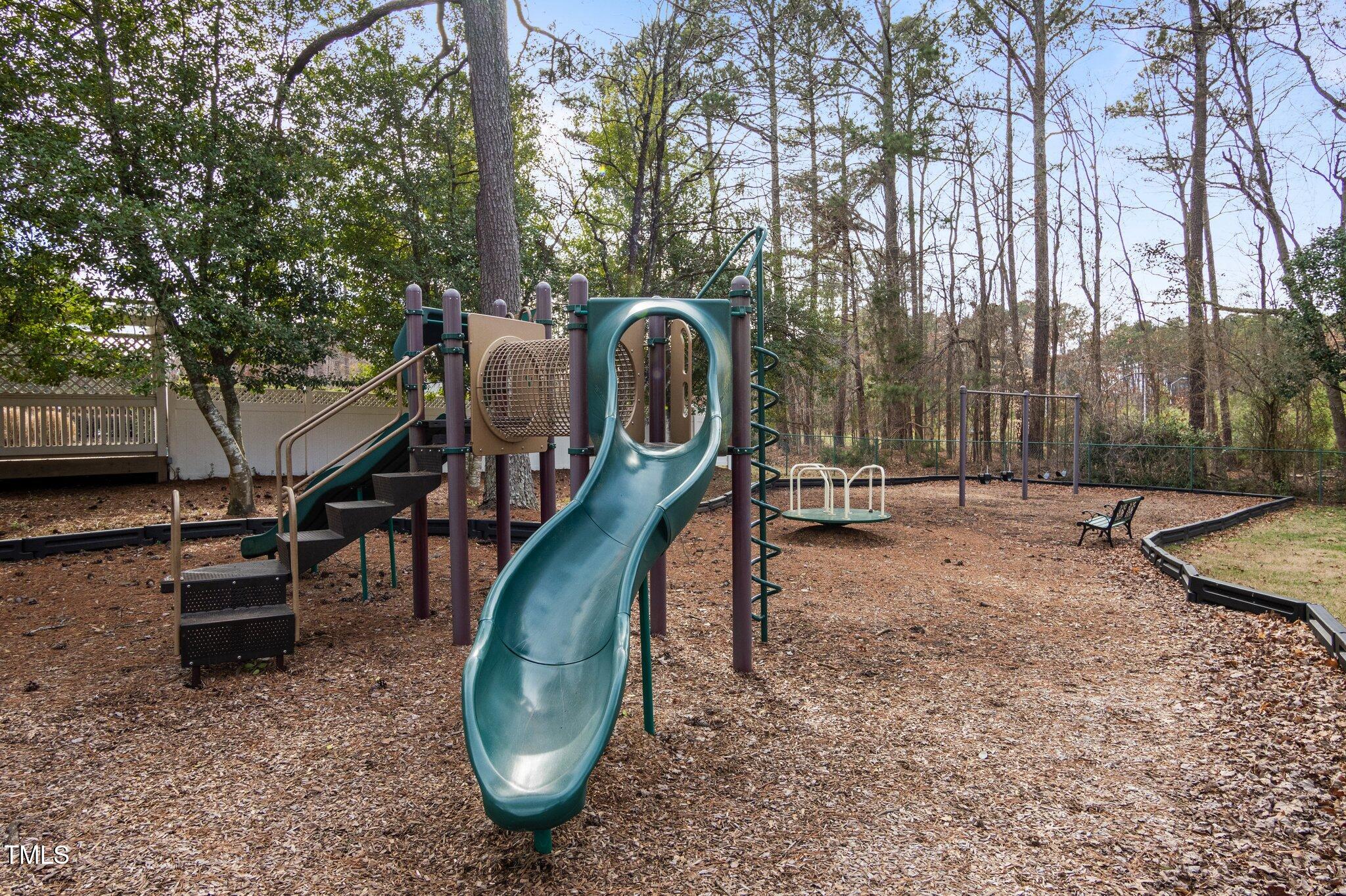 8804 Ross Court Raleigh, NC 27613 - Photo 38 of 38 a childrens park with lots of swings and slides