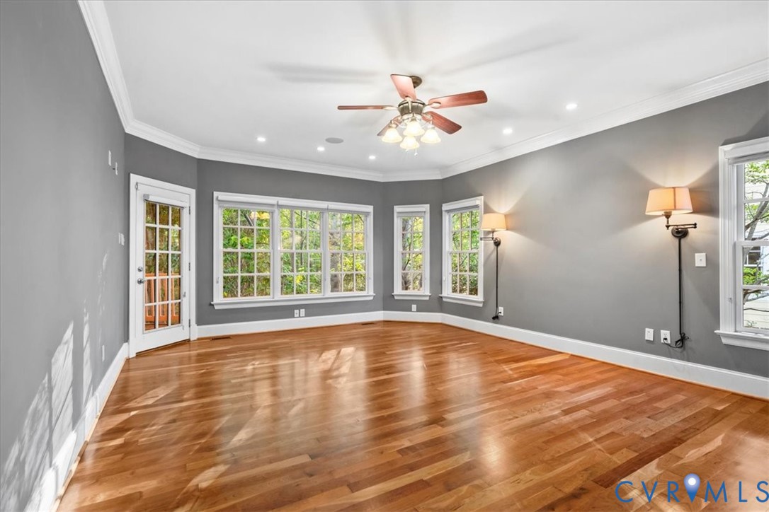 3308 Yarding Way Toano, VA 23168 - Photo 44 of 83 a view of an empty room with window and wooden floor
