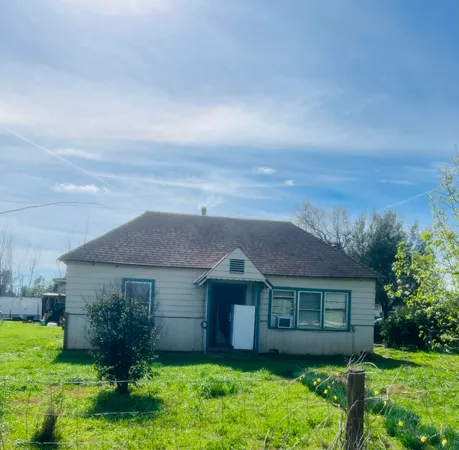 front view of house with a yard