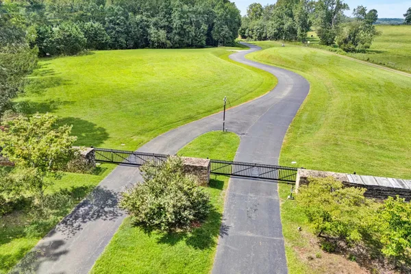 a view of a lake with a big yard