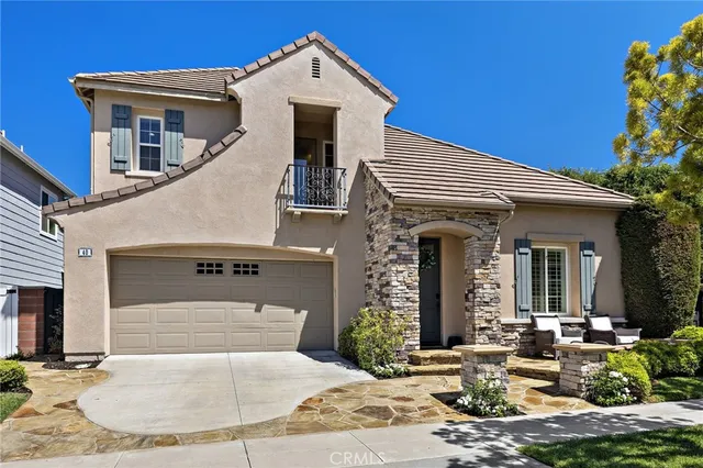 a front view of a house with entertaining space