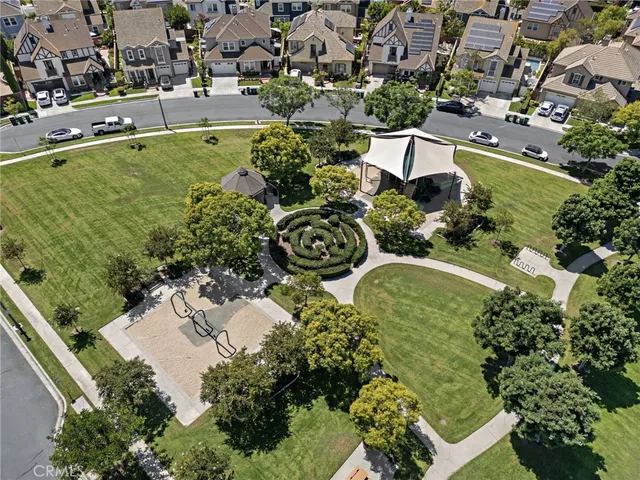 an aerial view of a house with a garden