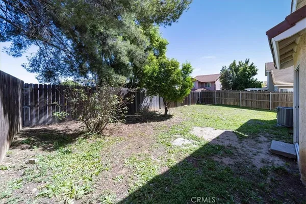 a view of a backyard with a garden