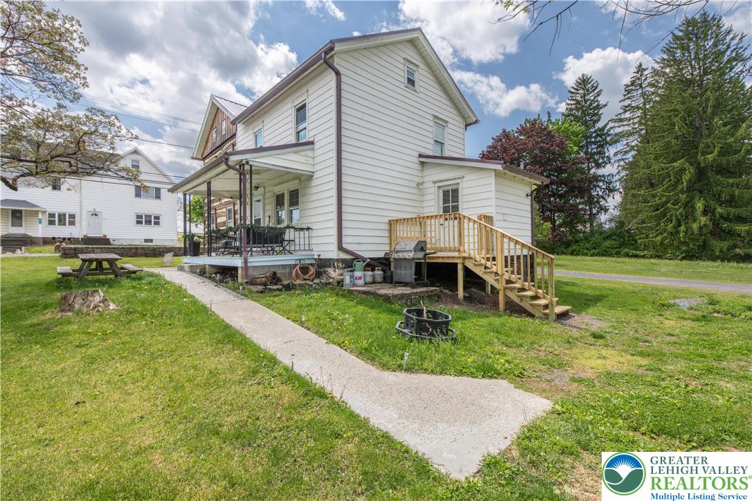 7281 Decatur Street New Tripoli, PA 18066 - Photo 18 of 24 a view of a house with a yard