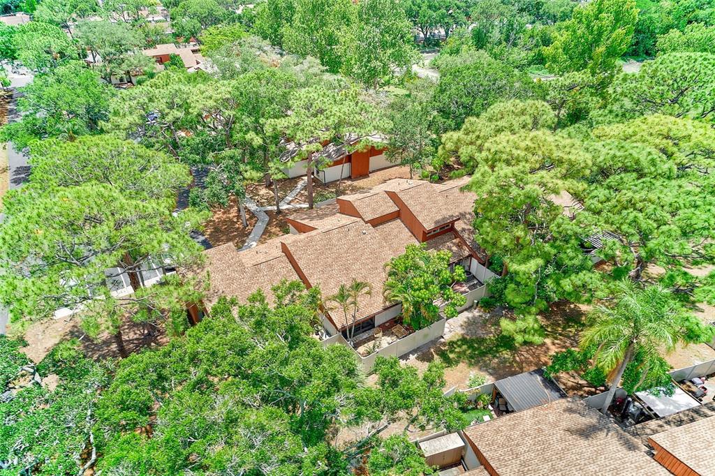 2064 Sunset Point Road, Unit 73 Clearwater, FL 33765 - Photo 51 of 58 an aerial view of a house with yard