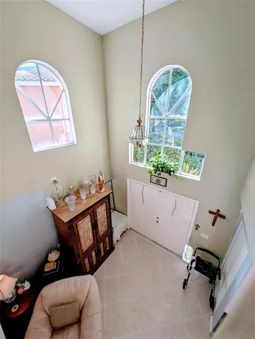 a view of a patio with chairs and backyard