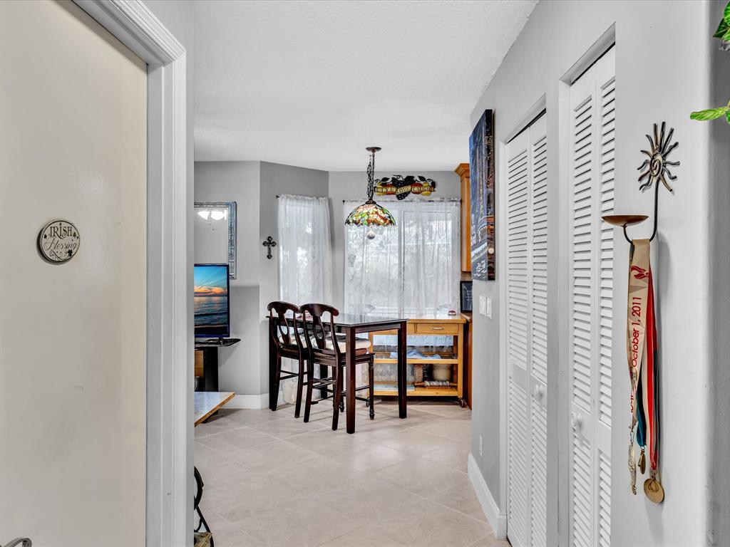 11240 Reveille Road Cooper City, FL 33026 - Photo 19 of 97 Looking down hall to breakfast area.