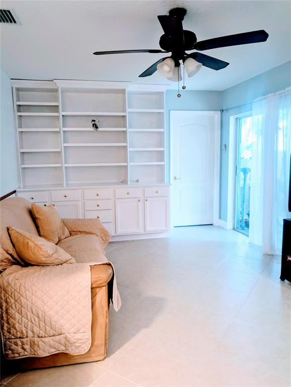 11240 Reveille Road Cooper City, FL 33026 - Photo 24 of 97 Sliding doors to roofed screened patio.