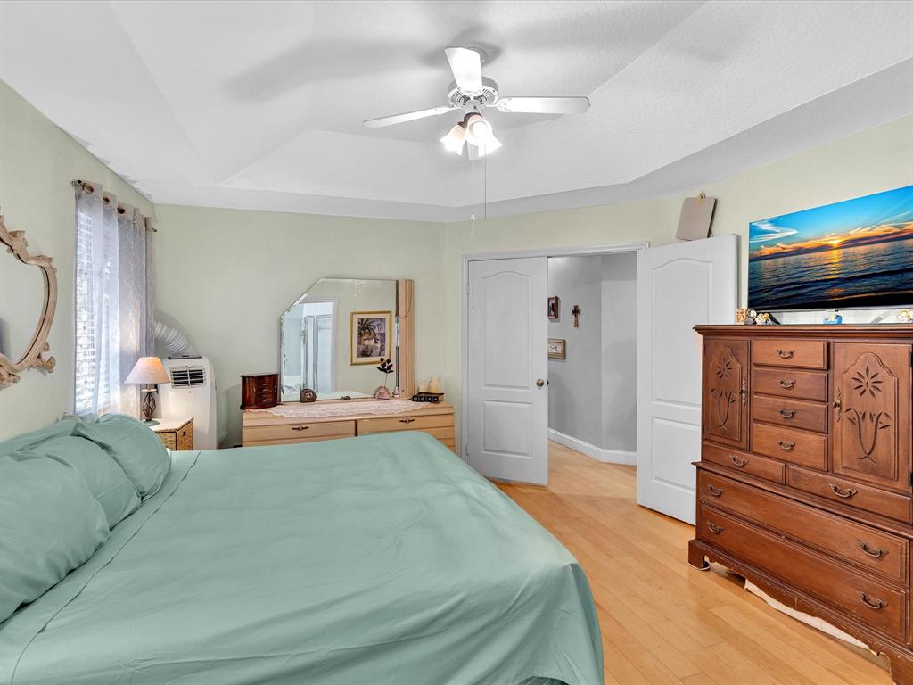 11240 Reveille Road Cooper City, FL 33026 - Photo 33 of 97 a living room with furniture and a flat screen tv