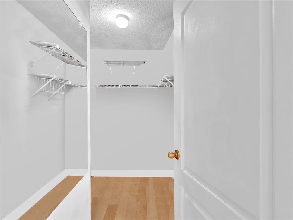 11240 Reveille Road Cooper City, FL 33026 - Photo 36 of 97 Master walk in closet. It's bigger than it seems here.