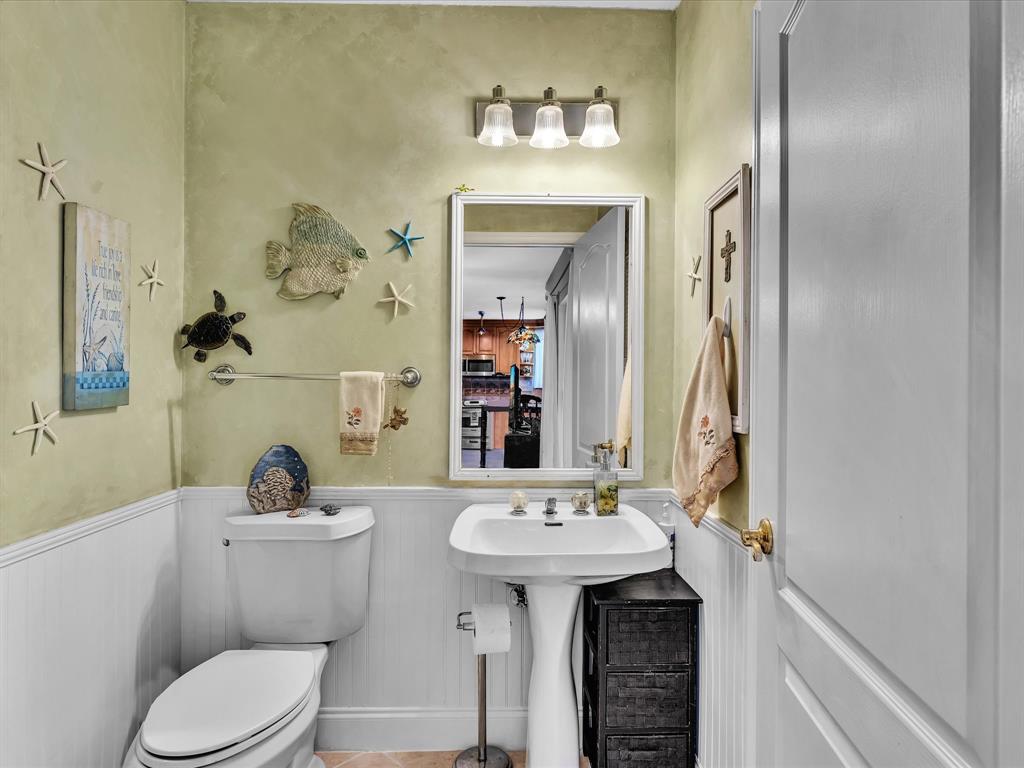 11240 Reveille Road Cooper City, FL 33026 - Photo 51 of 97 Cabana bath downstairs opens to the screened patio.