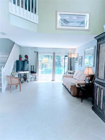 a bedroom with a bed and dresser