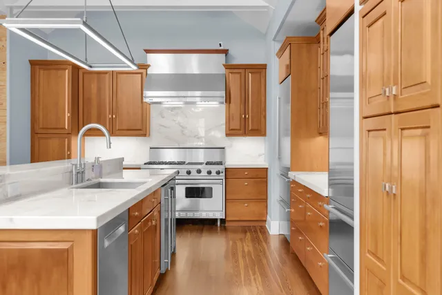 a bathroom with a sink vanity and a mirror