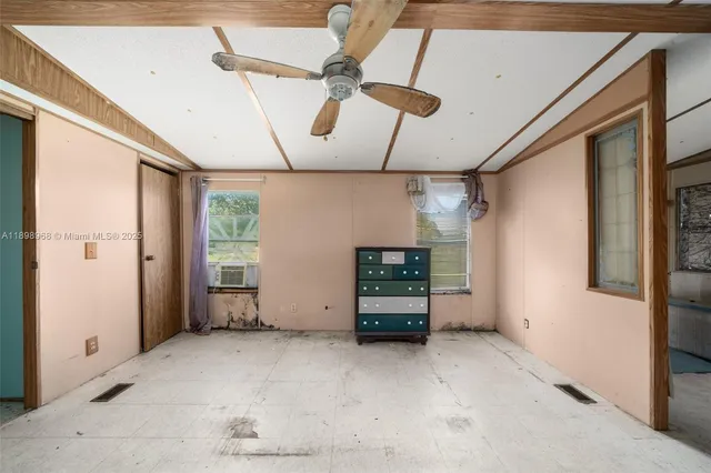 a view of a livingroom with furniture