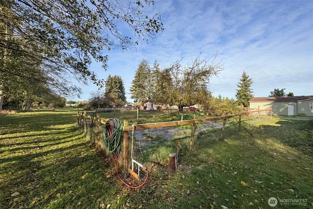 a view of lawn chairs and yard