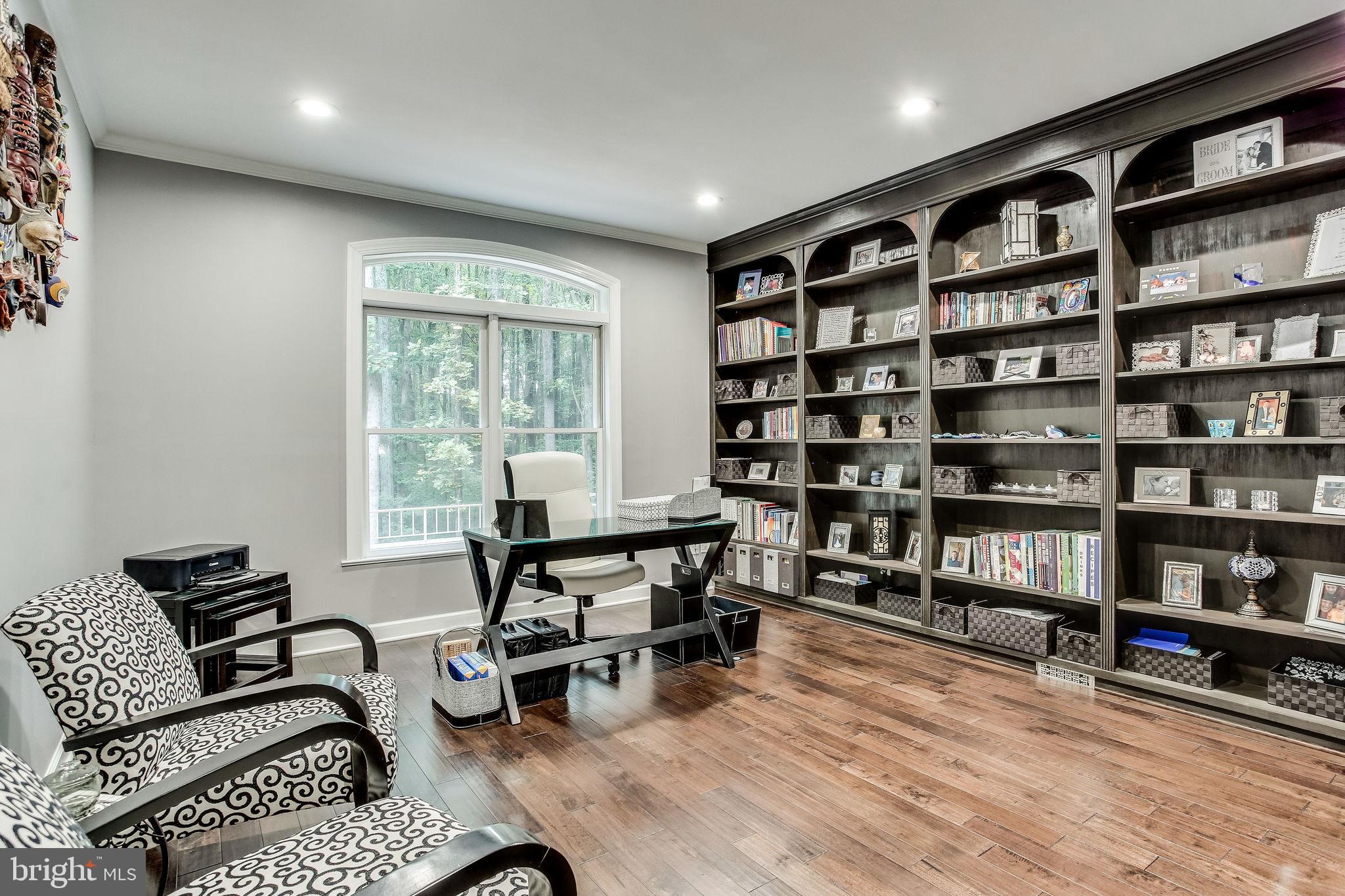 642 Springvale Road Great Falls, VA 22066 - Photo 12 of 44 Cozy Office with built-in cherry bookcases
