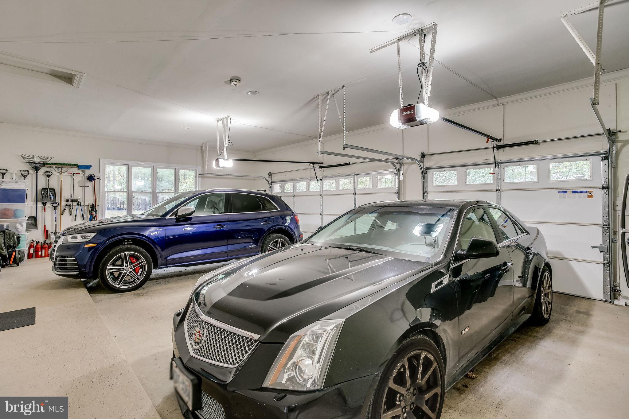 642 Springvale Road Great Falls, VA 22066 - Photo 21 of 44 Side load 3 Car Garage with tons of storage space