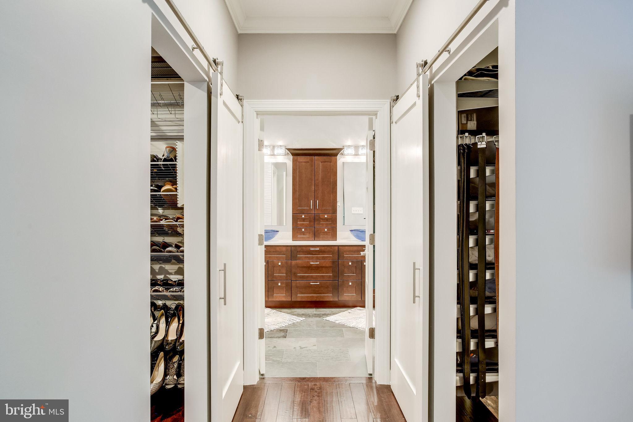 642 Springvale Road Great Falls, VA 22066 - Photo 26 of 44 His and hers walk-in closets fill both hallways