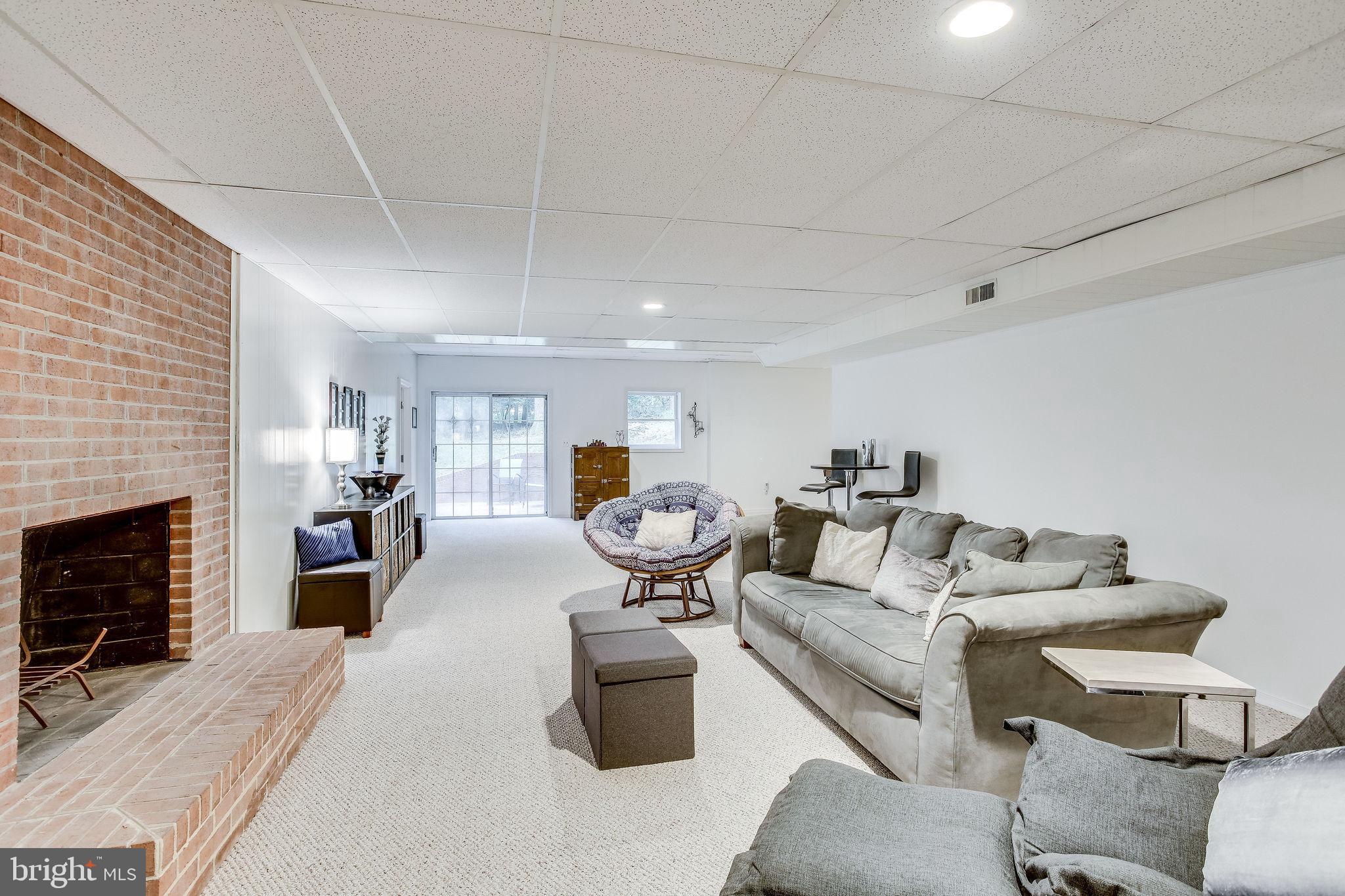 642 Springvale Road Great Falls, VA 22066 - Photo 35 of 44 Perfect for social gatherings around fireplace