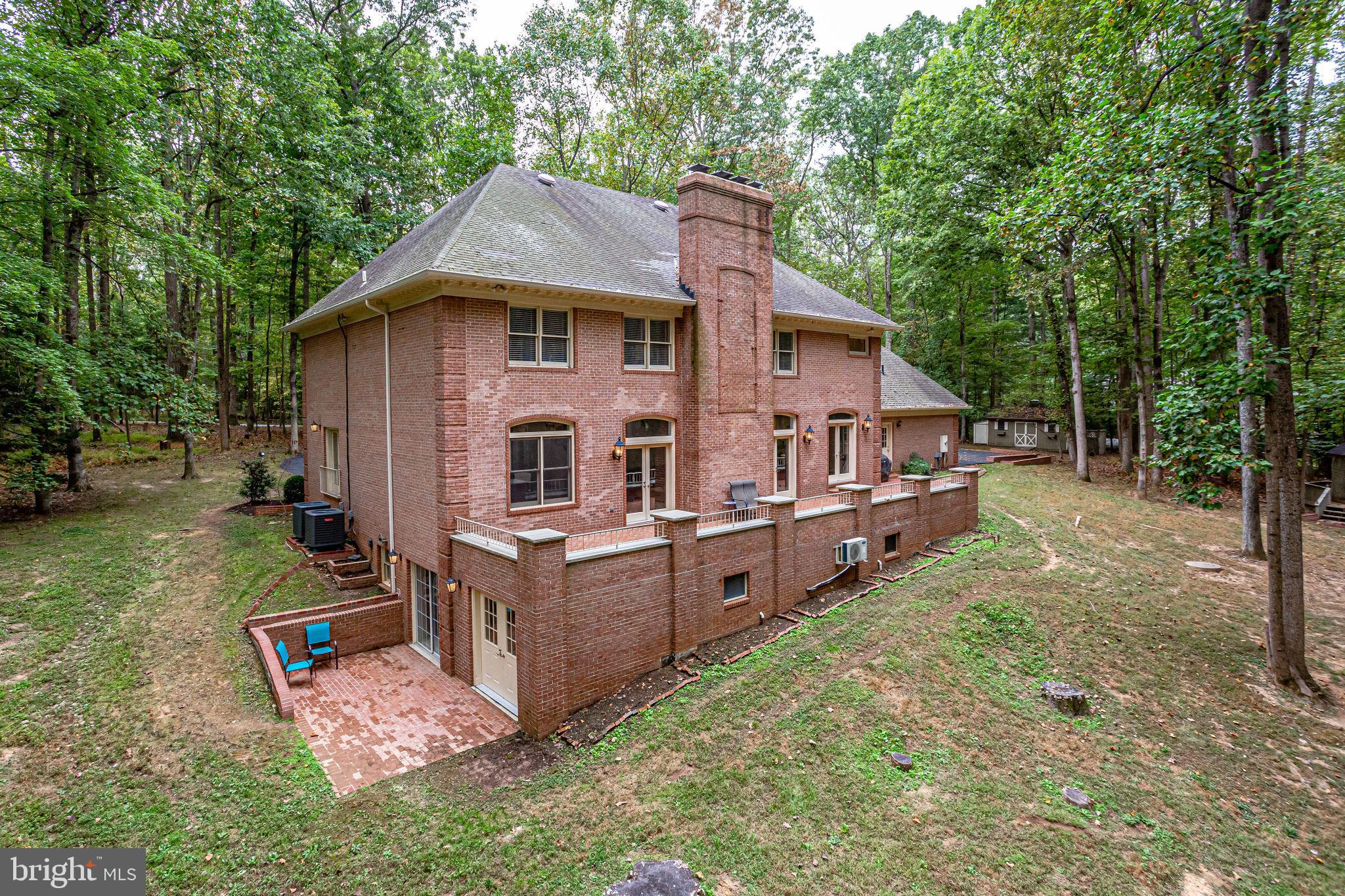 642 Springvale Road Great Falls, VA 22066 - Photo 39 of 44 Backyard oasis with mature trees & private stream