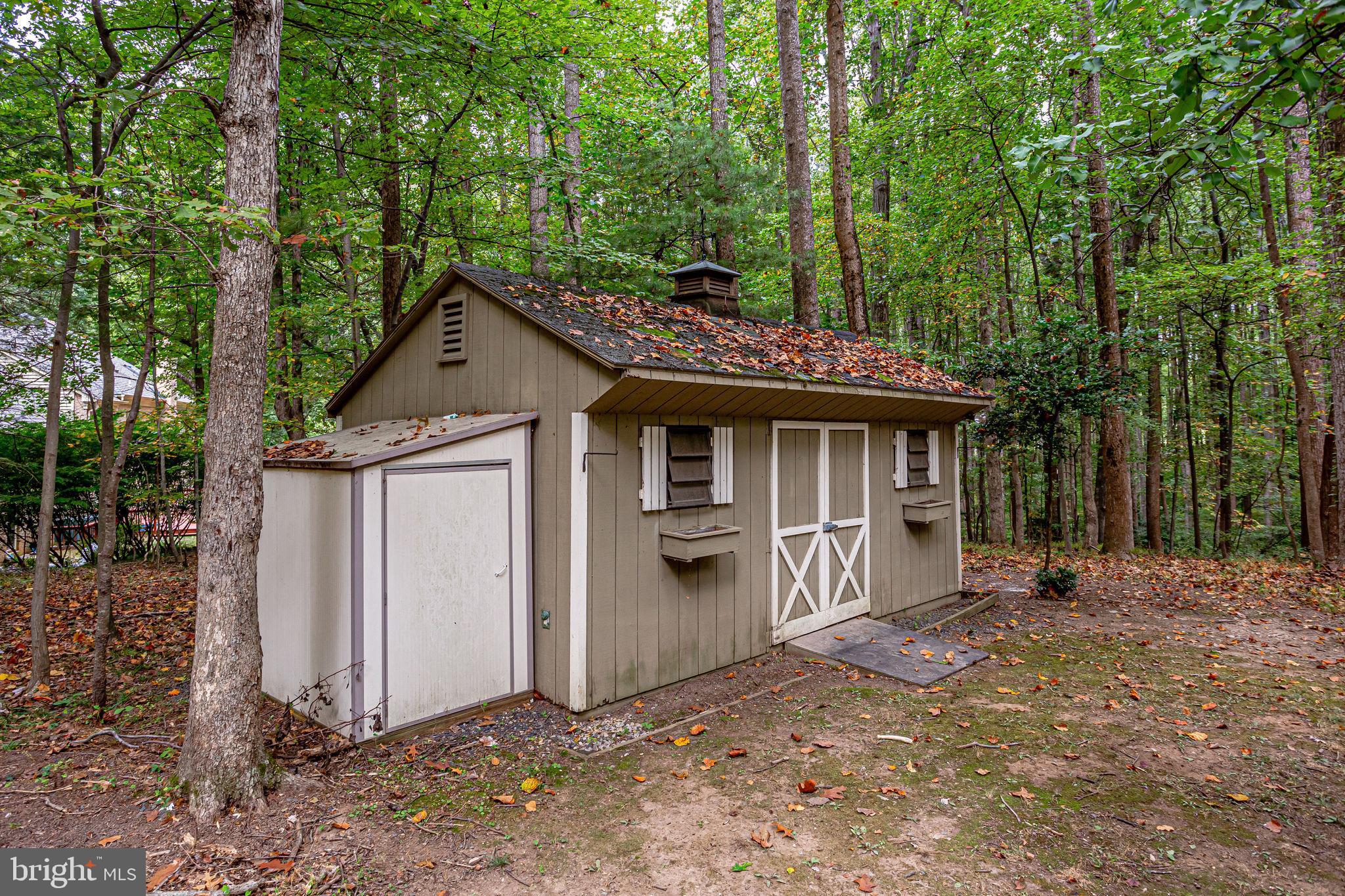 642 Springvale Road Great Falls, VA 22066 - Photo 40 of 44 Lg shed perfect for housing landscaping utensils