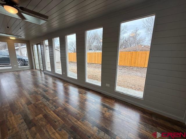 783 1550th Road Delta, CO 81416 - Photo 11 of 23 a view of an empty room with wooden floor and a window