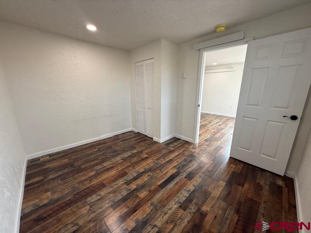 783 1550th Road Delta, CO 81416 - Photo 18 of 23 a view of empty room with wooden floor
