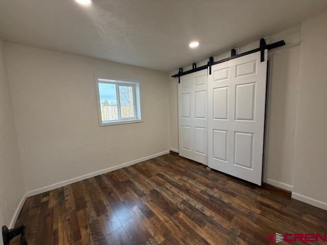 783 1550th Road Delta, CO 81416 - Photo 19 of 23 a view of an empty room with wooden floor