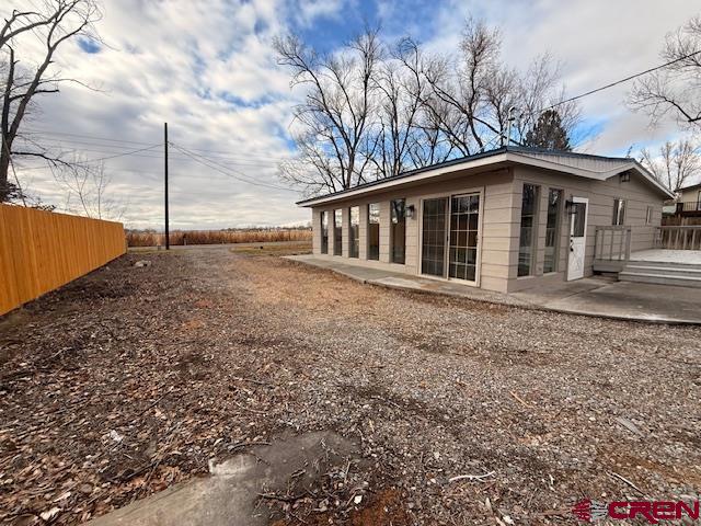 783 1550th Road Delta, CO 81416 - Photo 5 of 23 a view of a house with a yard