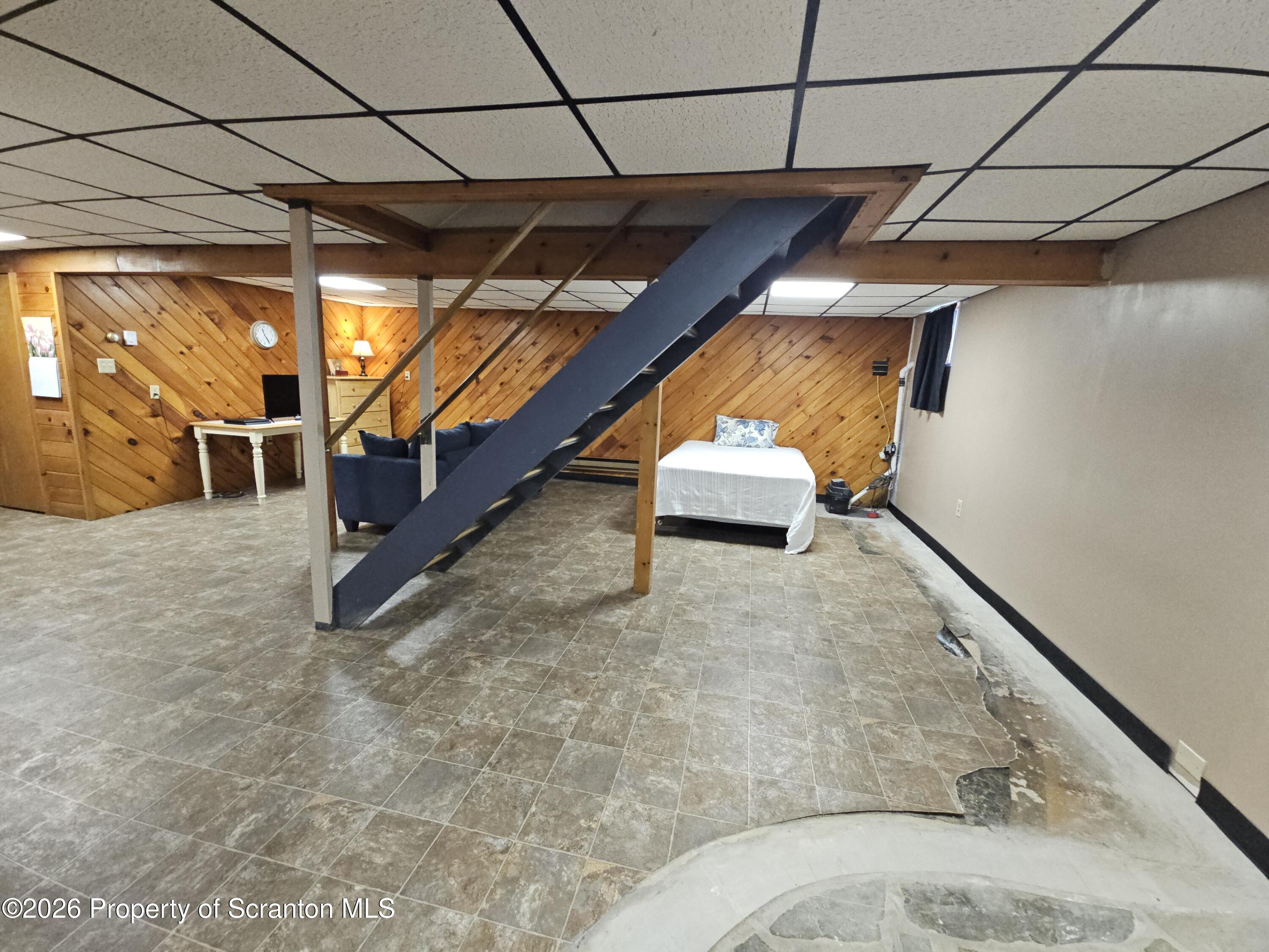 405 Baker Street Taylor, PA 18517 - Photo 28 of 36 a view of an empty room with wooden floor