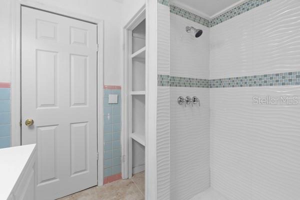 1404 East Alfred Street Tavares, FL 32778 - Photo 28 of 38 a bathroom with a shower