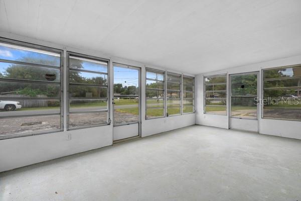 1404 East Alfred Street Tavares, FL 32778 - Photo 36 of 38 a view of an empty room with windows