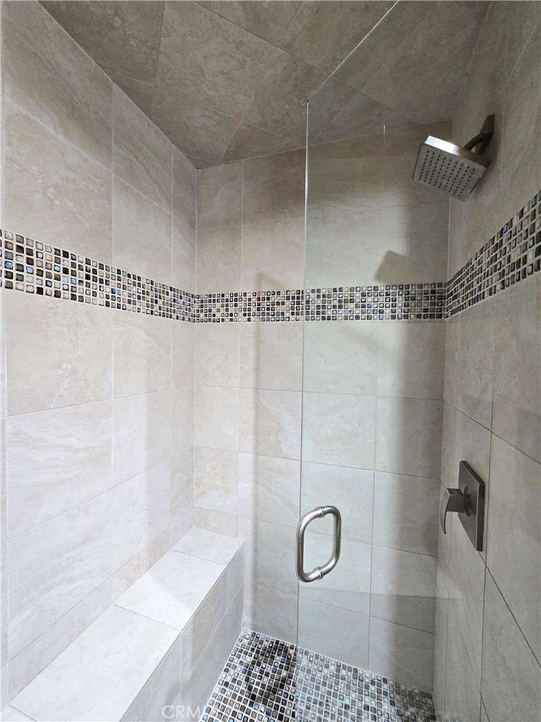 4651 Emerson Street Riverside, CA 92506 - Photo 19 of 32 a bathroom with a shower