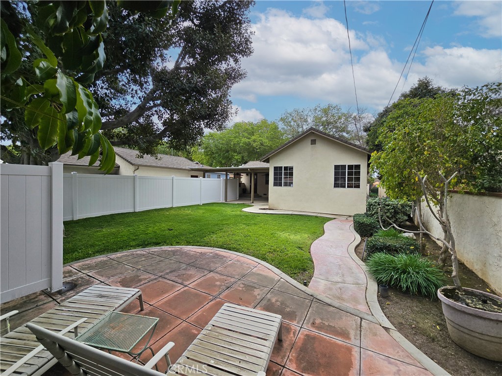 4651 Emerson Street Riverside, CA 92506 - Photo 28 of 32 a view of a yard with plants and large tree