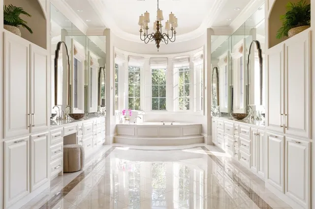 a dining room with fireplace furniture and a large window